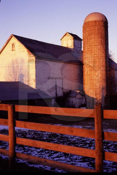 White Barn And Fence