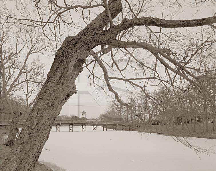 Spring Lake Pond And Footbridge, In Winter