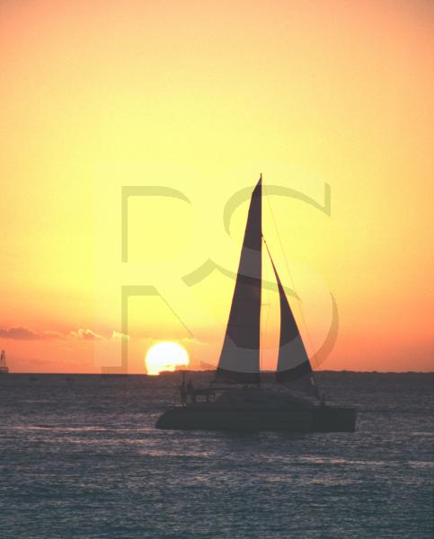 Schooner At Sunset