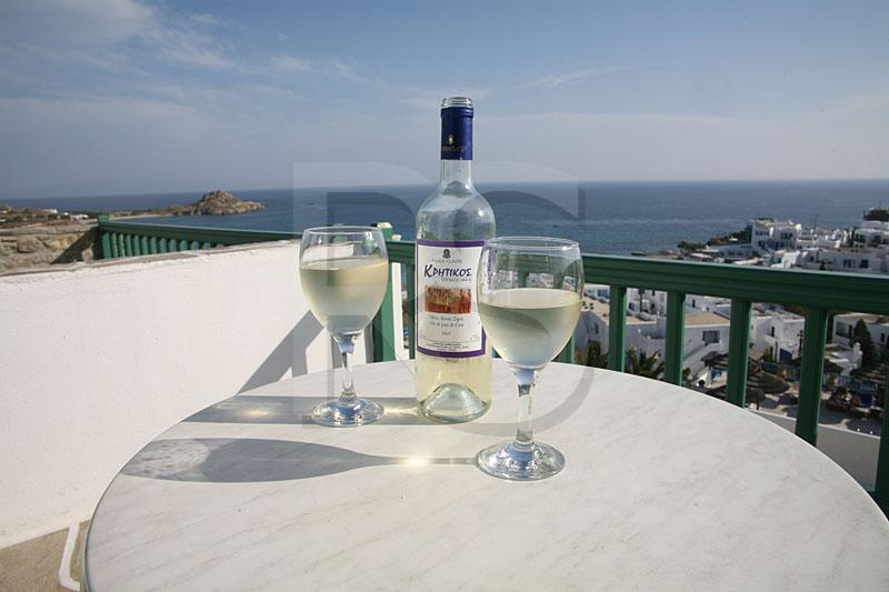 Wine And Glasses On Balcony