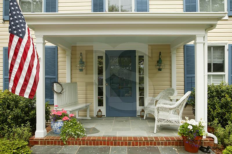 Porch With Wicker Chairs and Bench