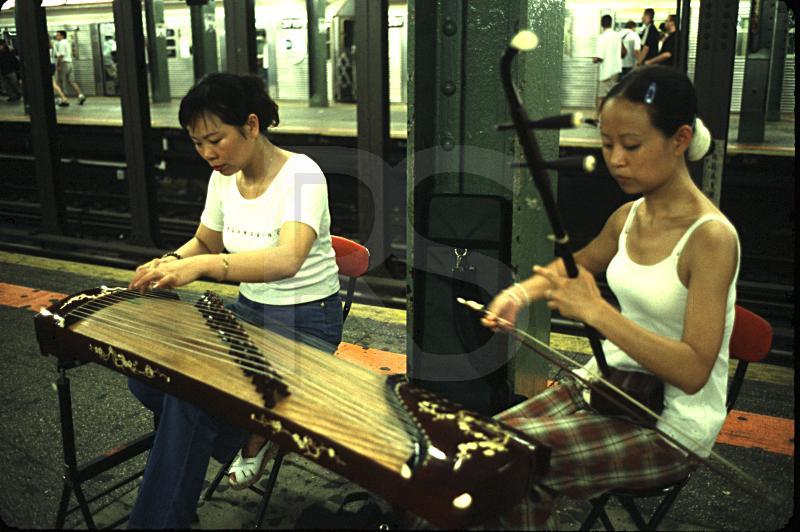 Chinese Musicans In Subway